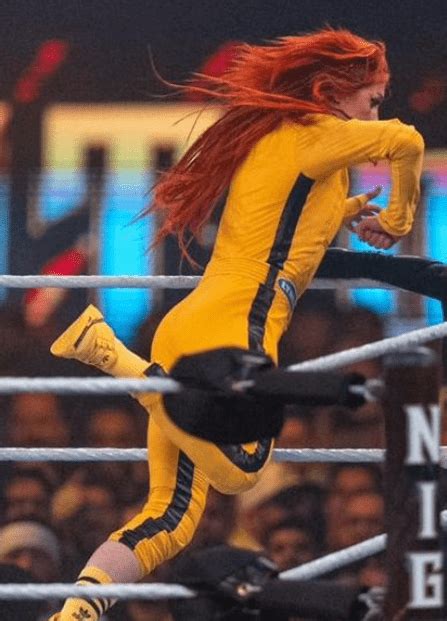 becky lynch yellow jumpsuit